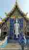 Blue Temple standing white Buddha in Chiang Rai
