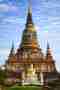 Wat Yaichaimongkhol ancient stupa and white Buddha